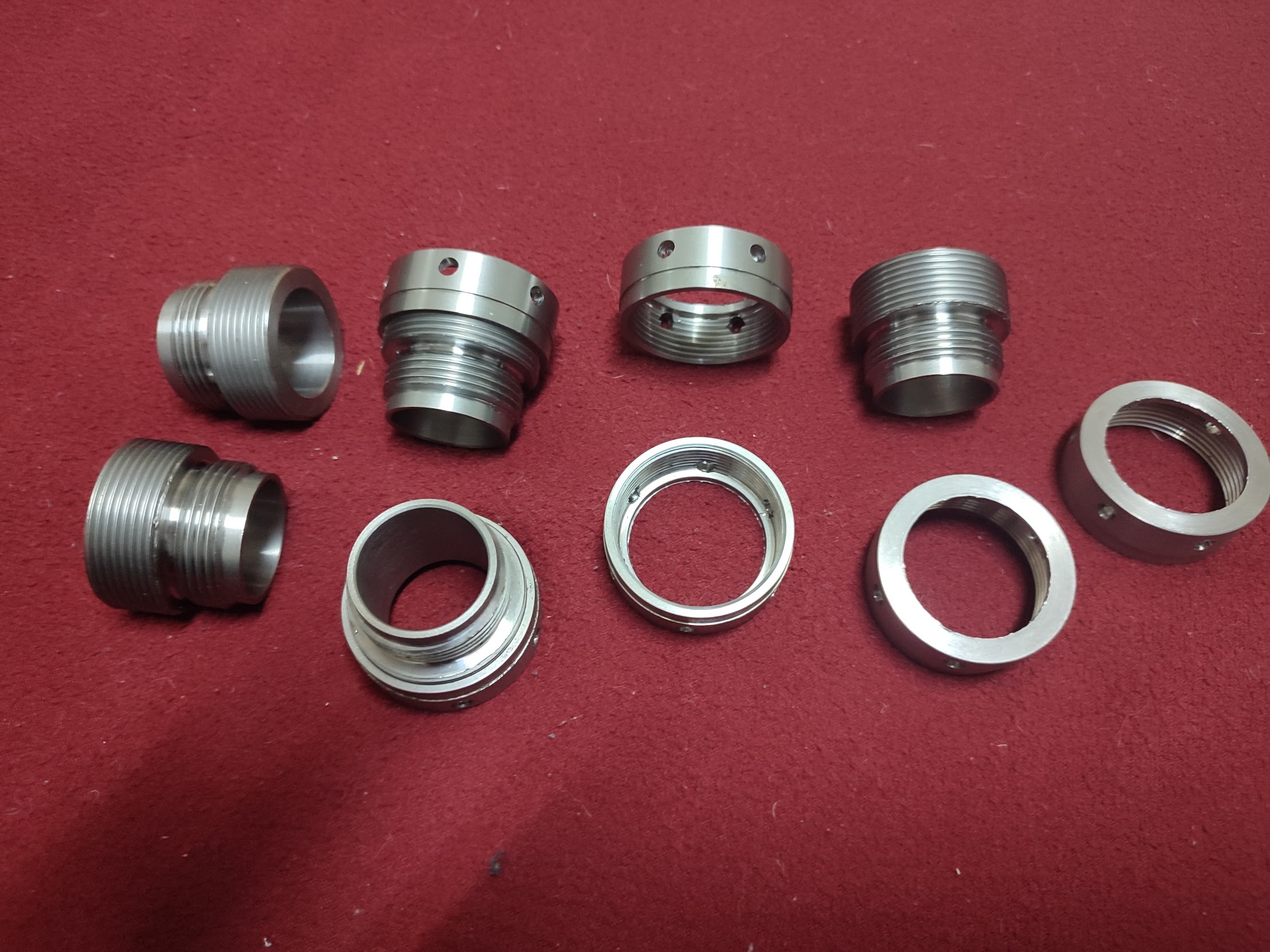 Exhaust Port Thread and Nut Group