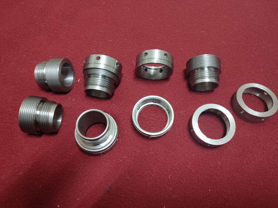 Exhaust Port Thread and Nut Group